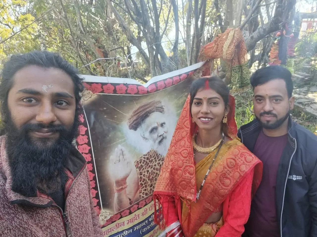 The couple with the monks who made the day possible